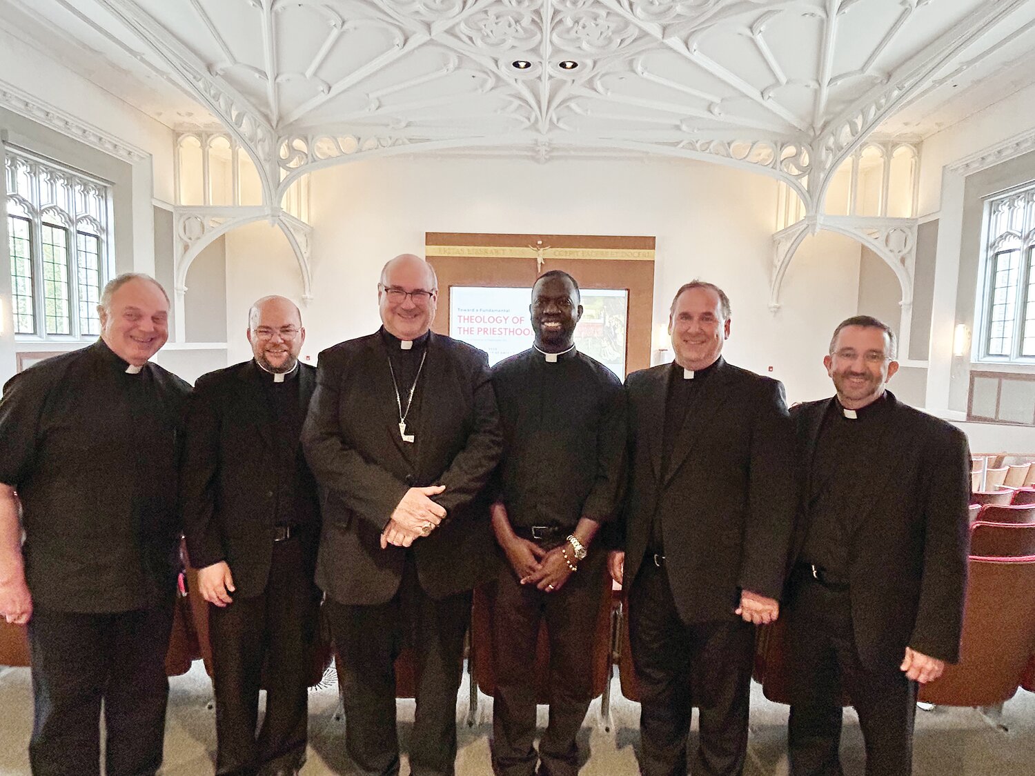 On May 16, Bishop Richard G. Henning and priests of the Diocese of Providence attended the Thomistic Institute Symposium, “Toward a Fundamental Theology of the Priesthood,” held at Catholic University of America, Washington, D.C. Pictured from left, Father Thomas Ferland, Father Brendan Rowley, Bishop Henning, Father Joseph Brice, Msgr. Albert Kenney and Father Carl Fisette.